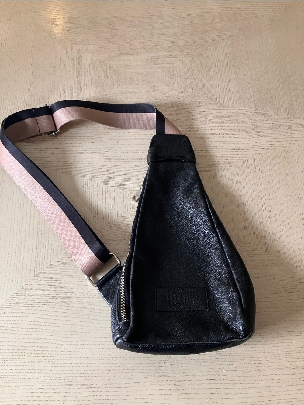 Prüne Black Leather Sling Backpack with Tan/Beige and Black Strap